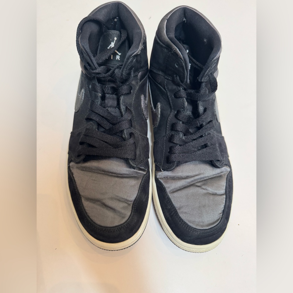 Black and Gray High-Top Nike Air Jordans
